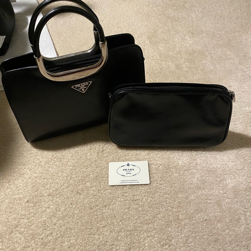 Prada , black doctor bag